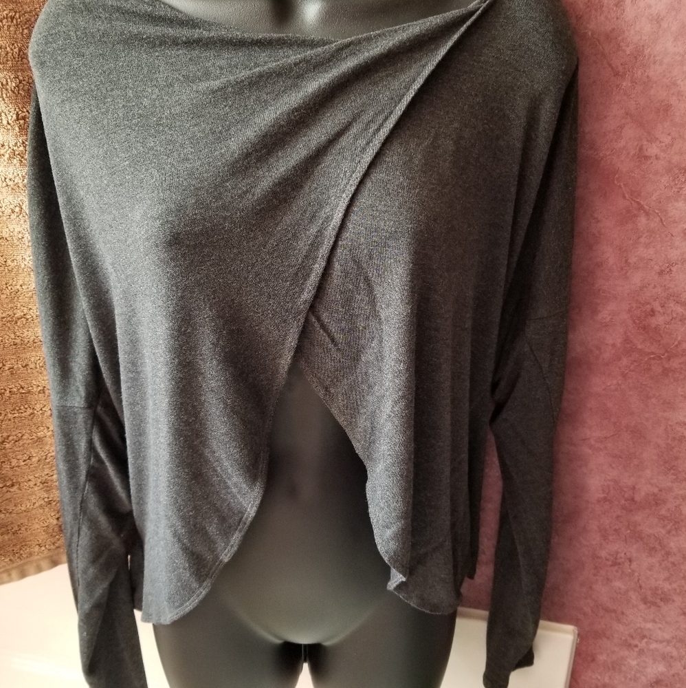 Women’s long sleeve open back champion shirt.